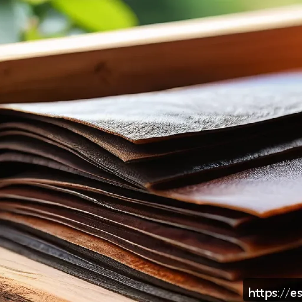 콤부차 가죽의 기술적 혁신 - A close-up view of kombucha leather sheets in various stages of fermentation, showcasing diverse tex...